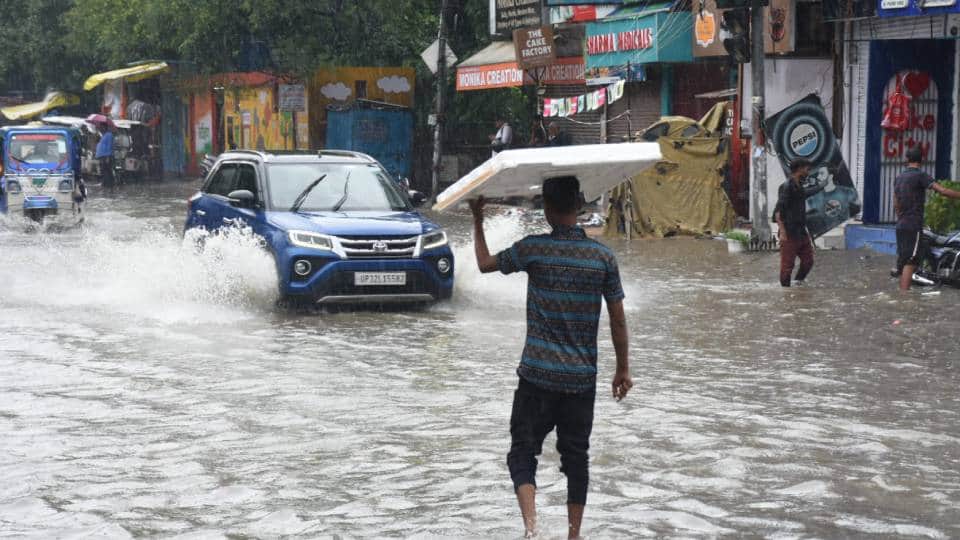 Lucknow inundated by rain 12 UP districts hit by floods