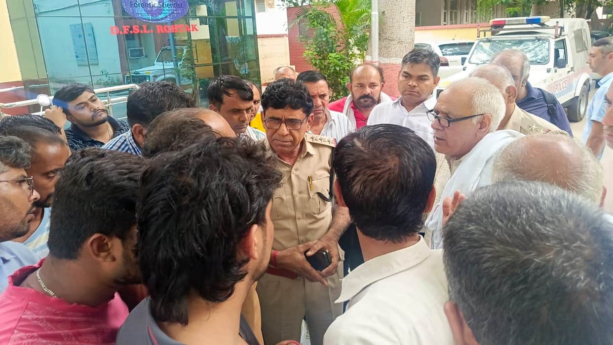Protest outside police station demanding arrest of husband-mother-in-law accused in dowry death case Rohtak