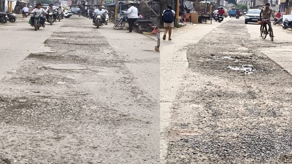 countless potholes in the road