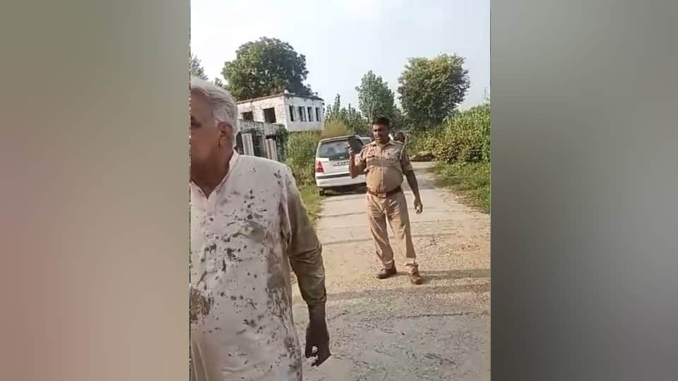 UP farmer sets himself on fire Officials remained mere spectators while a sub-inspector kept recording a video