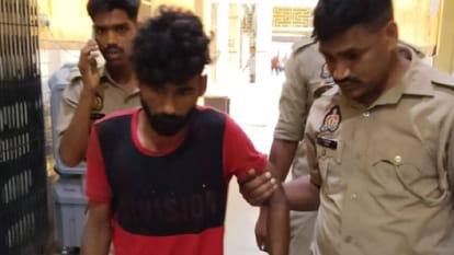 पुलिस हिरासत में आरोपी।
