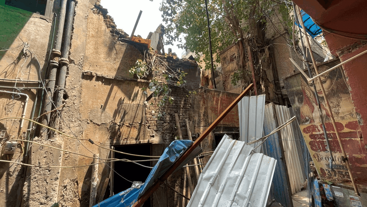 Several people injured after the wall of an old building collapsed in the Karol Bagh
