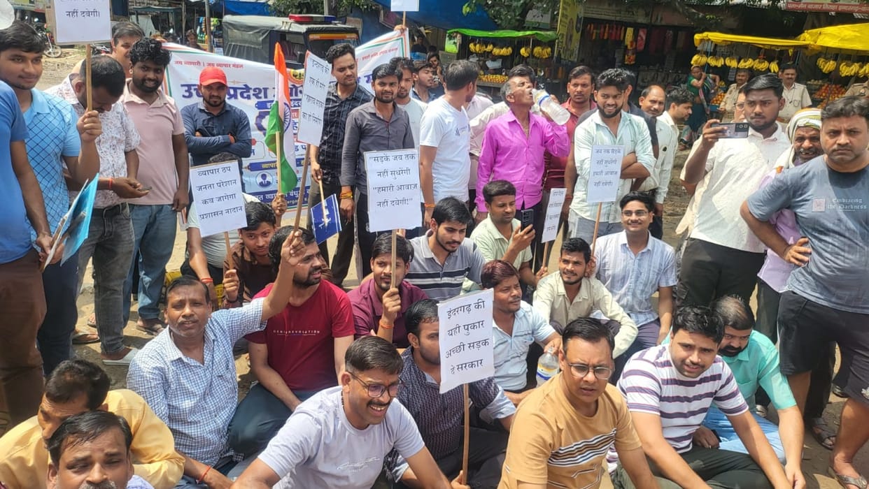 Kannauj Traders anger erupts protest held against dilapidated roads waterlogging No road no vote they declare