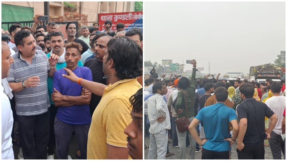 Sonipat Villagers sit on National Highway 44 with the body of dhaba owner Narendra at Kundli Border
