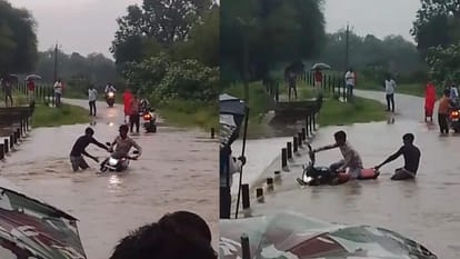 पुल पार कर रहे युवक की बाइक बही।