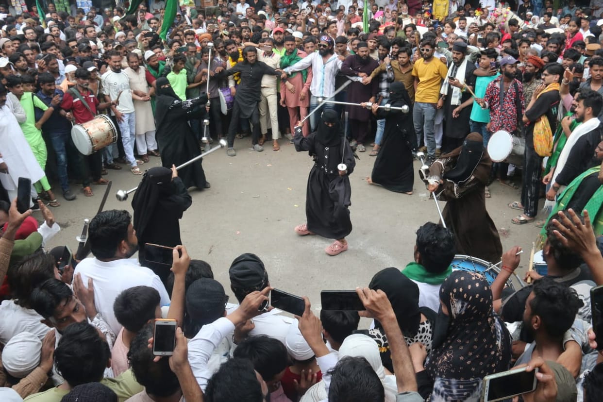 Eid-e-Milad-un-Nabi procession in Bhopal: Women in burqas display swordsmanship skills; crowds throng the old