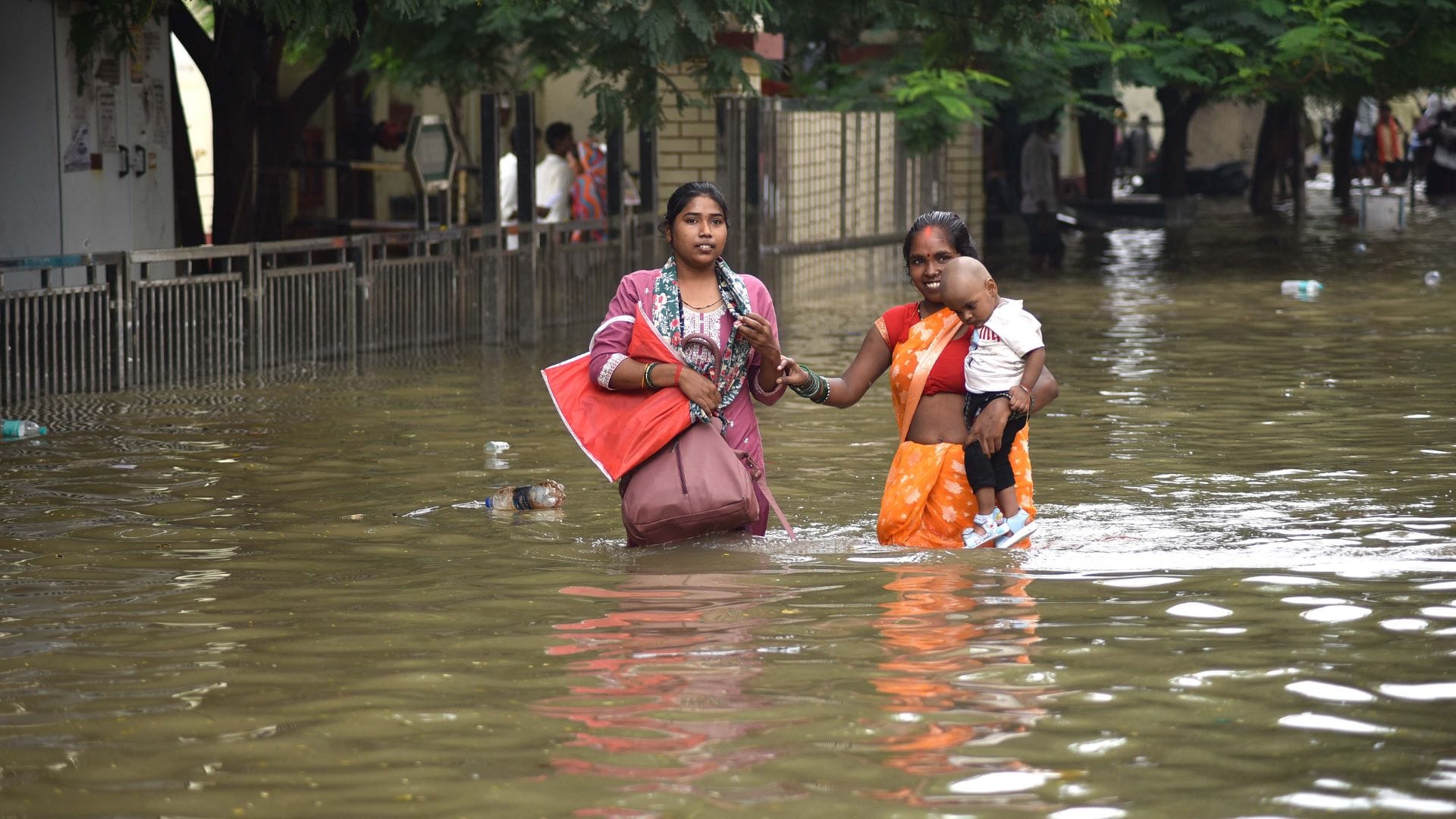 rain in Banaras latest photos of waterlogging in homes shops and at railway station airport