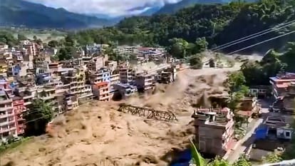 Glacier burst Tibet causes devastation Nepal Hydropower project villages washed away thousands missing.