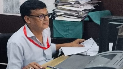 Two RTO clerks, Bipin and Madhur, suspended after being found guilty in an inquiry