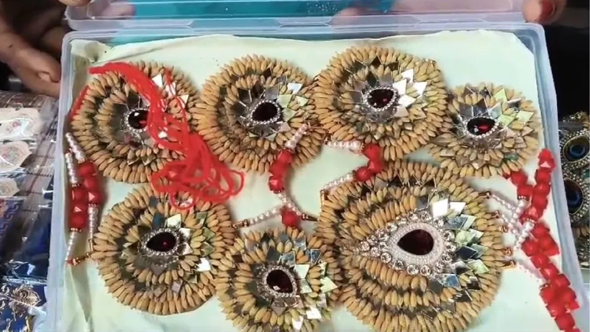 On Rakshabandhan, women of Mungeli made unique Rakhis from paddy, coriander and lemon seeds
