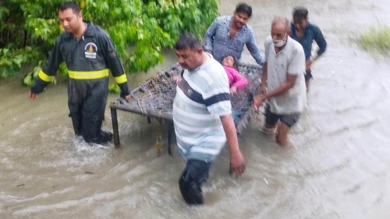 Jhansi: Fire department rescues a differently-abled woman stranded in waterlogging