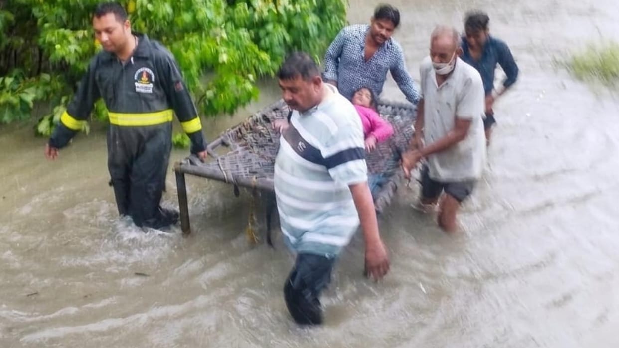 Jhansi: Fire department rescues a differently-abled woman stranded in waterlogging