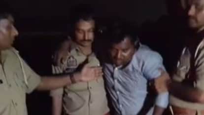 घायल बदमाश को अस्पताल ले जाती पुलिस।