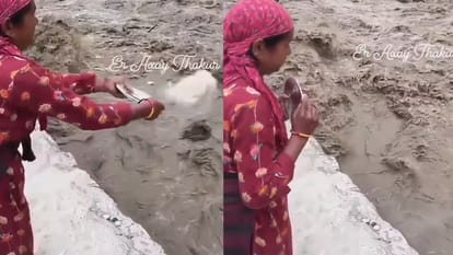 नेपाल में उफनती नदी के सामने सिर झुकाती महिला का वीडियो वायरल, देखकर आंखों में आ जाएंगे आंसू