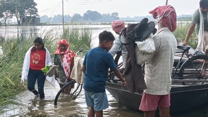 Sisters arrive boat tie Rakhis Saryu water level receded hardships persist flood havoc continues in Azamgarh