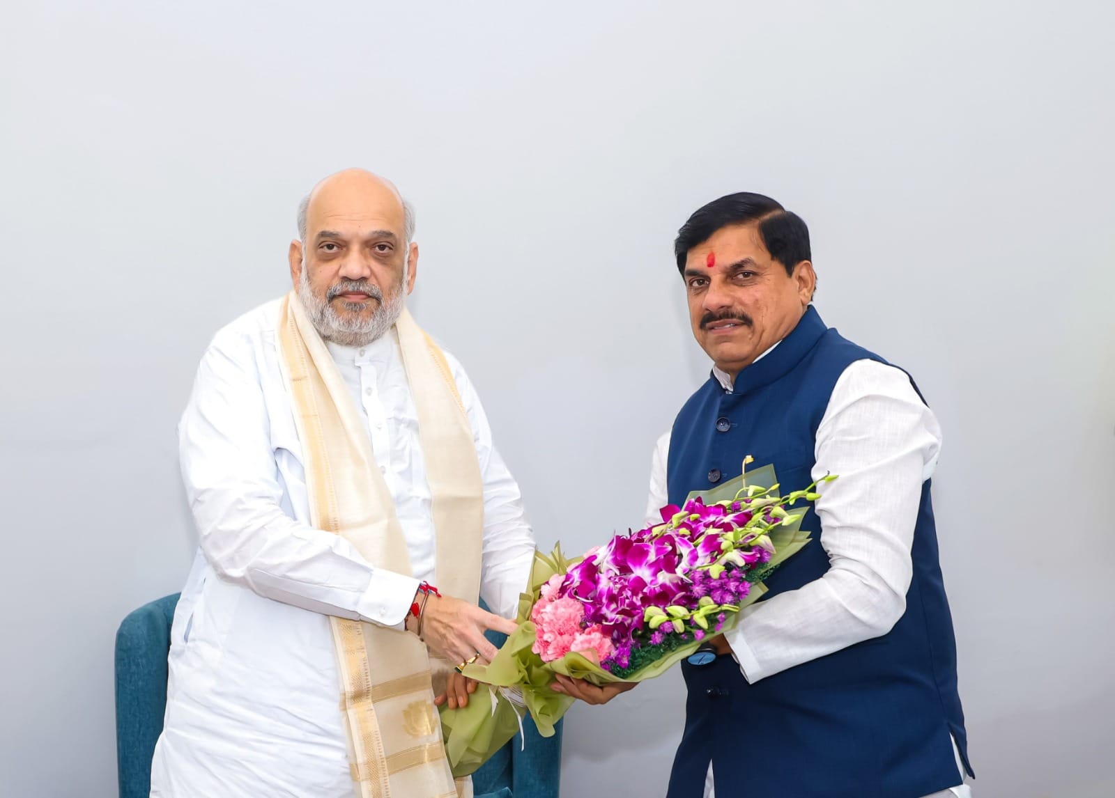 केंद्रीय मंत्री अमित शाह और सीएम मोहन यादव