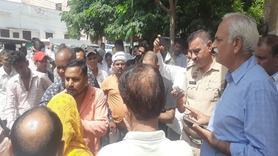 Protest by sanitation workers at the Government Middle School in Model Town, Sonipat.
