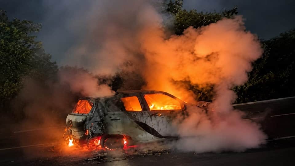 Moving Swift Car Catches Fire, Police Rescue Passengers in Time