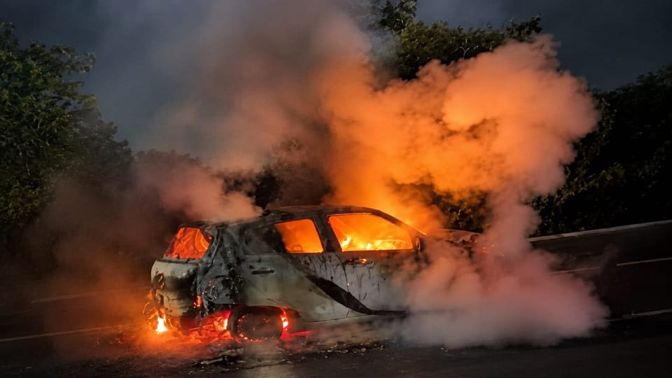 Moving Swift Car Catches Fire, Police Rescue Passengers in Time
