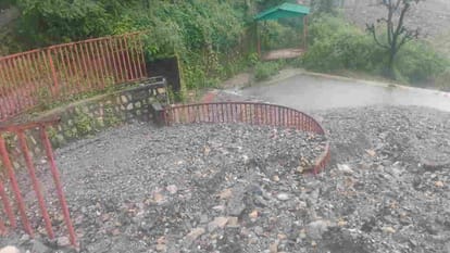 Rain brings debris to Dharkot Barerna road natural sulfur water source buried under debris traffic blocked