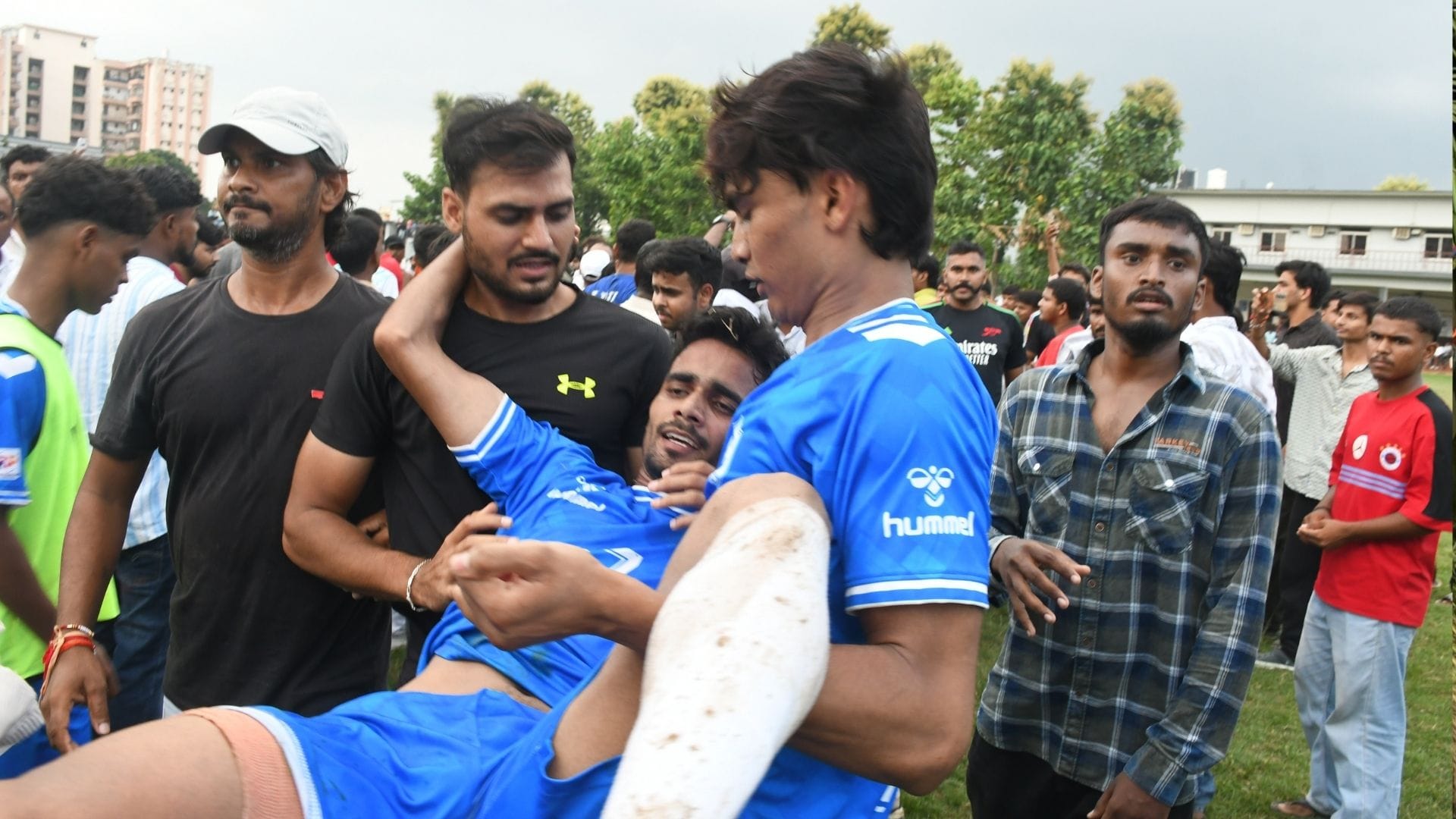 Players clash during football match at Gorakhpur's St. Andrew's College ground; final cancelled.