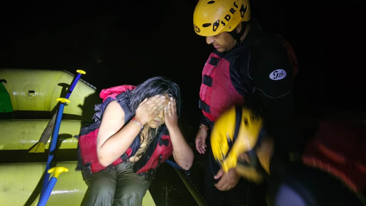 Dehradun Rain Tragedy Car Swept Away in Flash Flood Two Dead Woman Rescued by SDRF Uttarakhand news