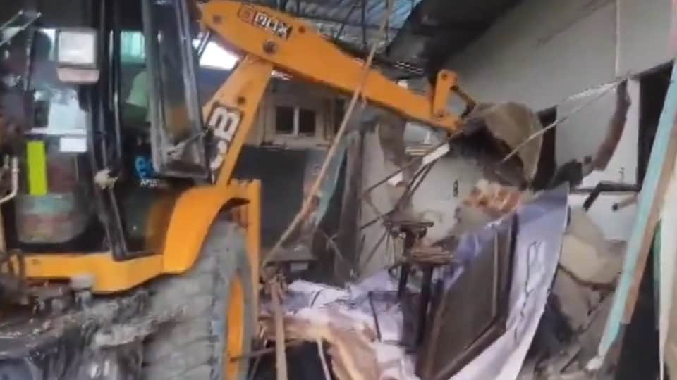 A bulldozer operation is underway at Alpha Garden following a court order to clear DDA land