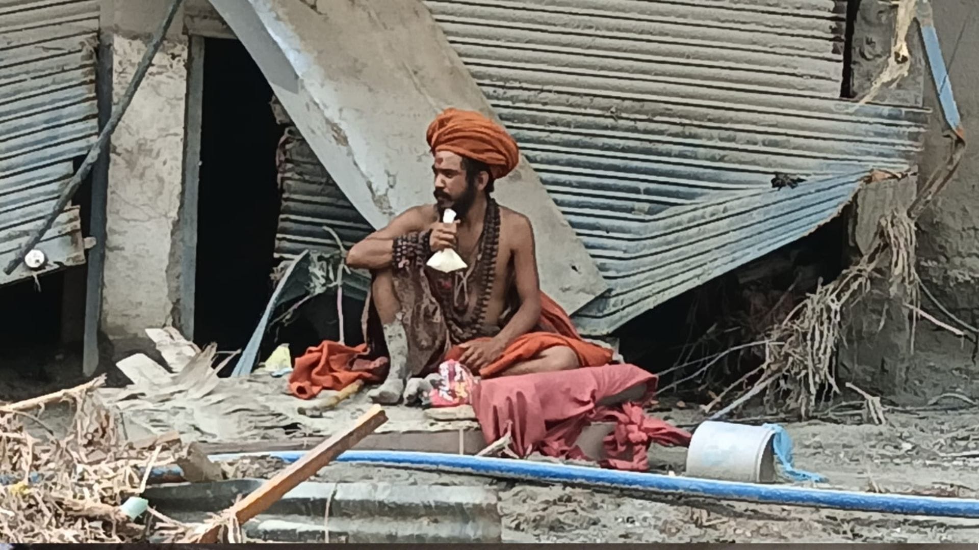 14 dead and 200 homes destroyed in Devighat during the Nepal tragedy; blood seeping from the rubble.