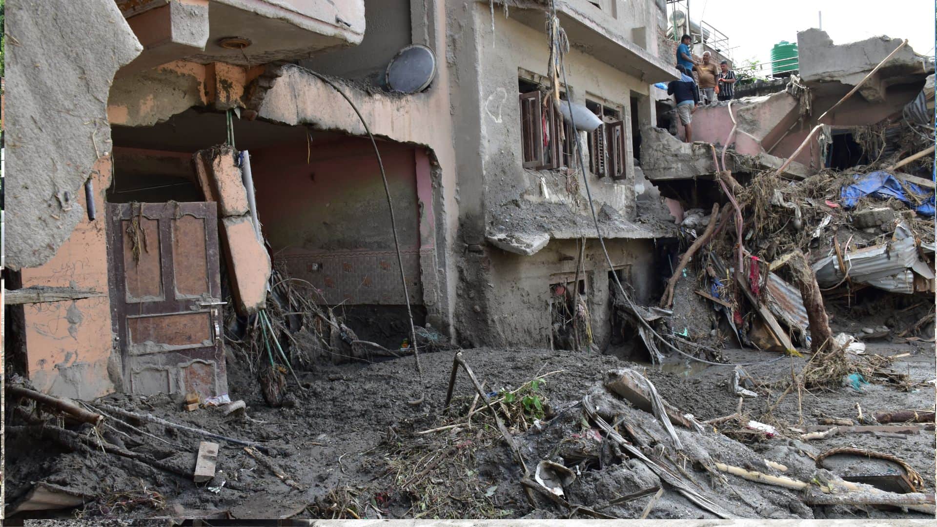 14 dead and 200 homes destroyed in Devighat during the Nepal tragedy; blood seeping from the rubble.