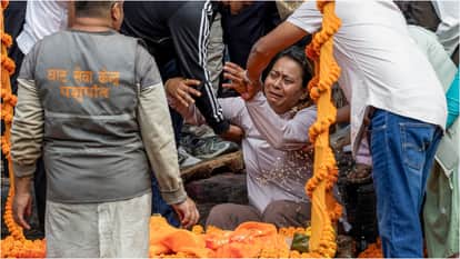 nepal flash flood missing people families doing effigy funeral emotional scene