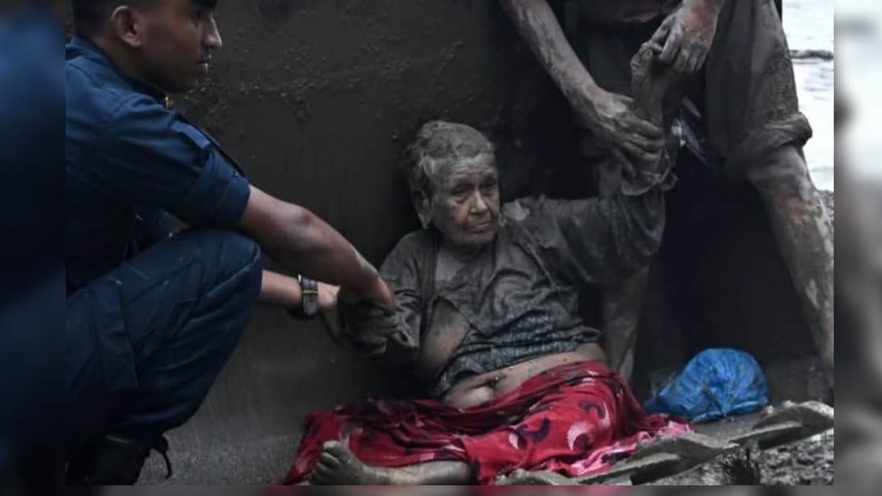 A 97-year-old woman pulled from flood debris in Nepal is recovering in hospital