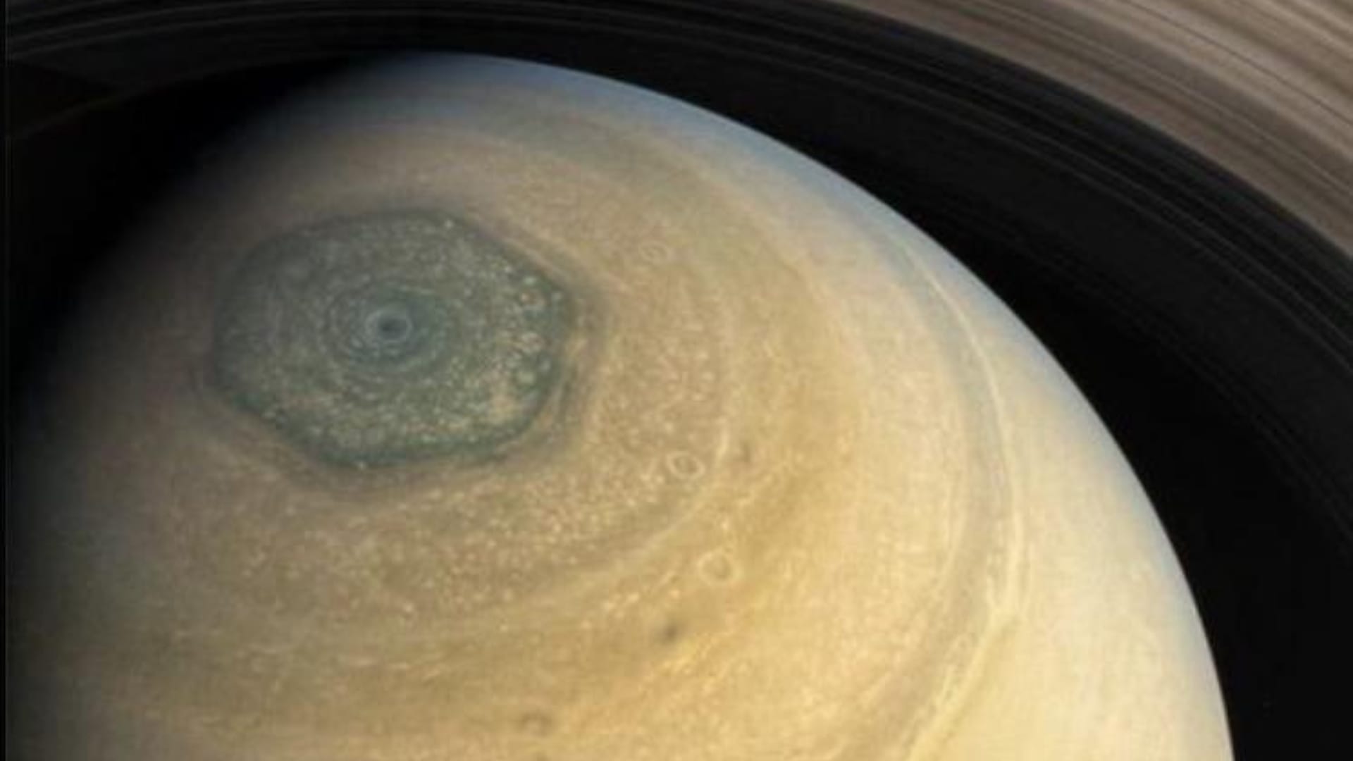 scientists find a huge 10 sided wave pattern swirling in clouds over saturns south pole