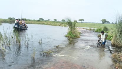 Five Devara villages surrounded floodwaters Boats become lifeline amidst displacement access roads submerged