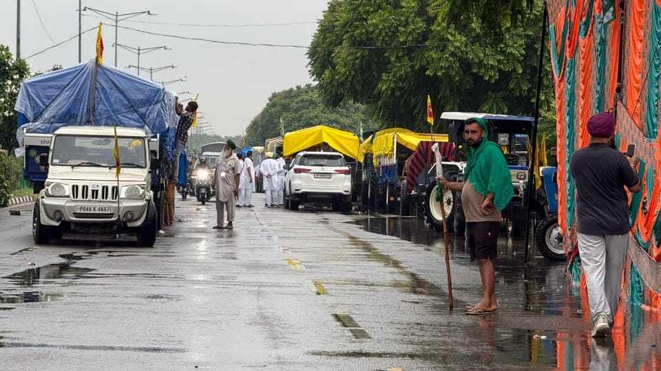 Farmers Stand Firm at Protest Site in Mohali Despite Rain