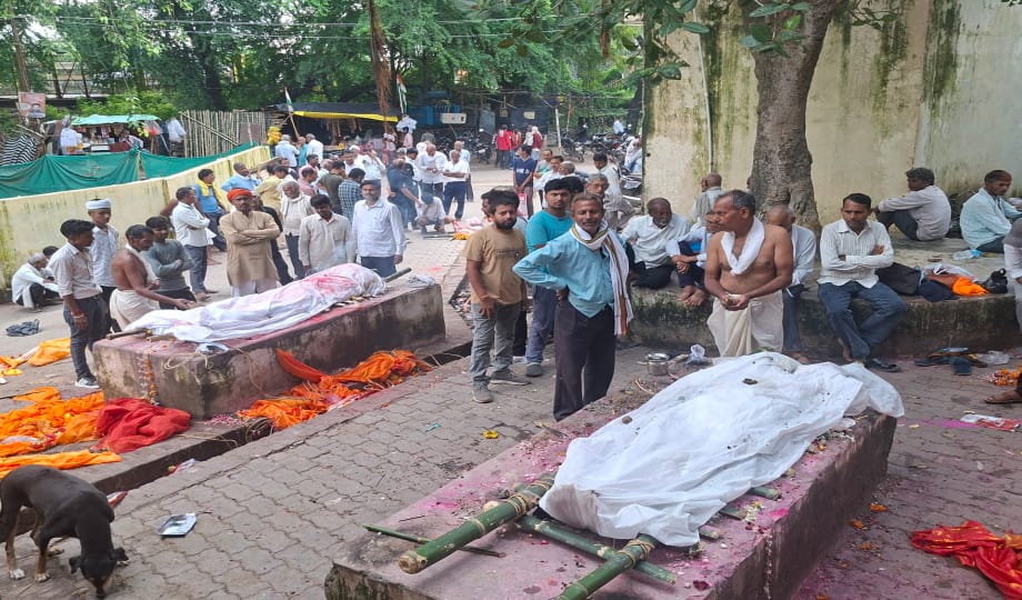 Water at the ghat... bodies being cremated using electricity instead of wood; waiting is inevitable.