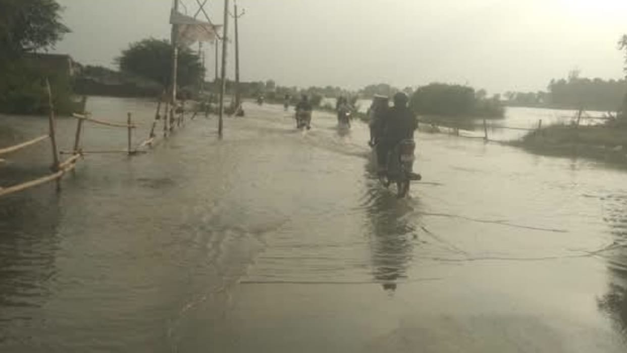 Ganga river water level rises two feet of water inundates the Shamsabad-Dhai Ghat road in Shahjahanpur