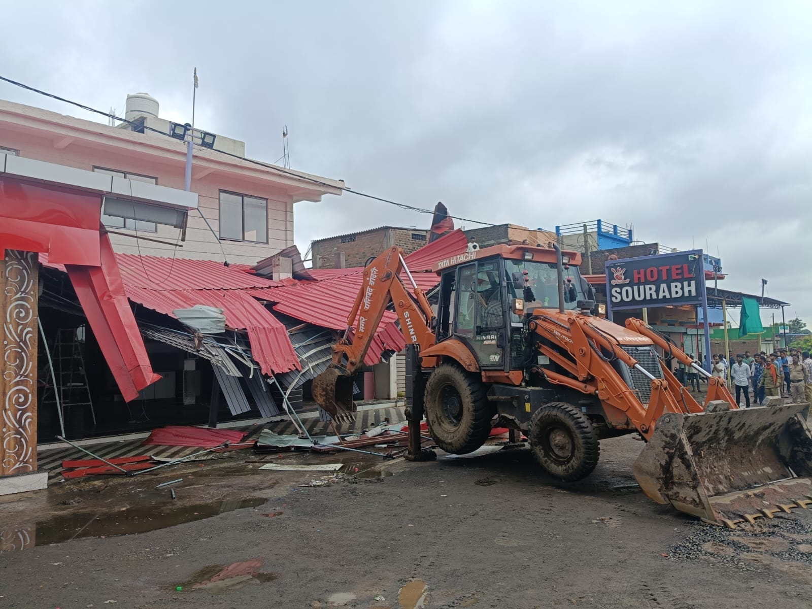 sagar liquor case bulldozer action illegal encroachments