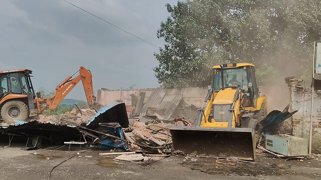 sagar liquor case bulldozer action illegal encroachments