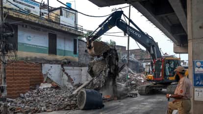Shops demolished in Jammu's Satwari for highway expansion work
