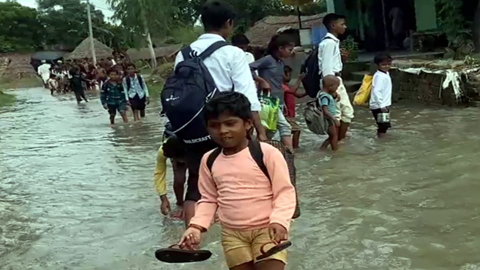 Flood Blocks Hospital Route Seven-Year-Old Boy Dies in Father’s Arms