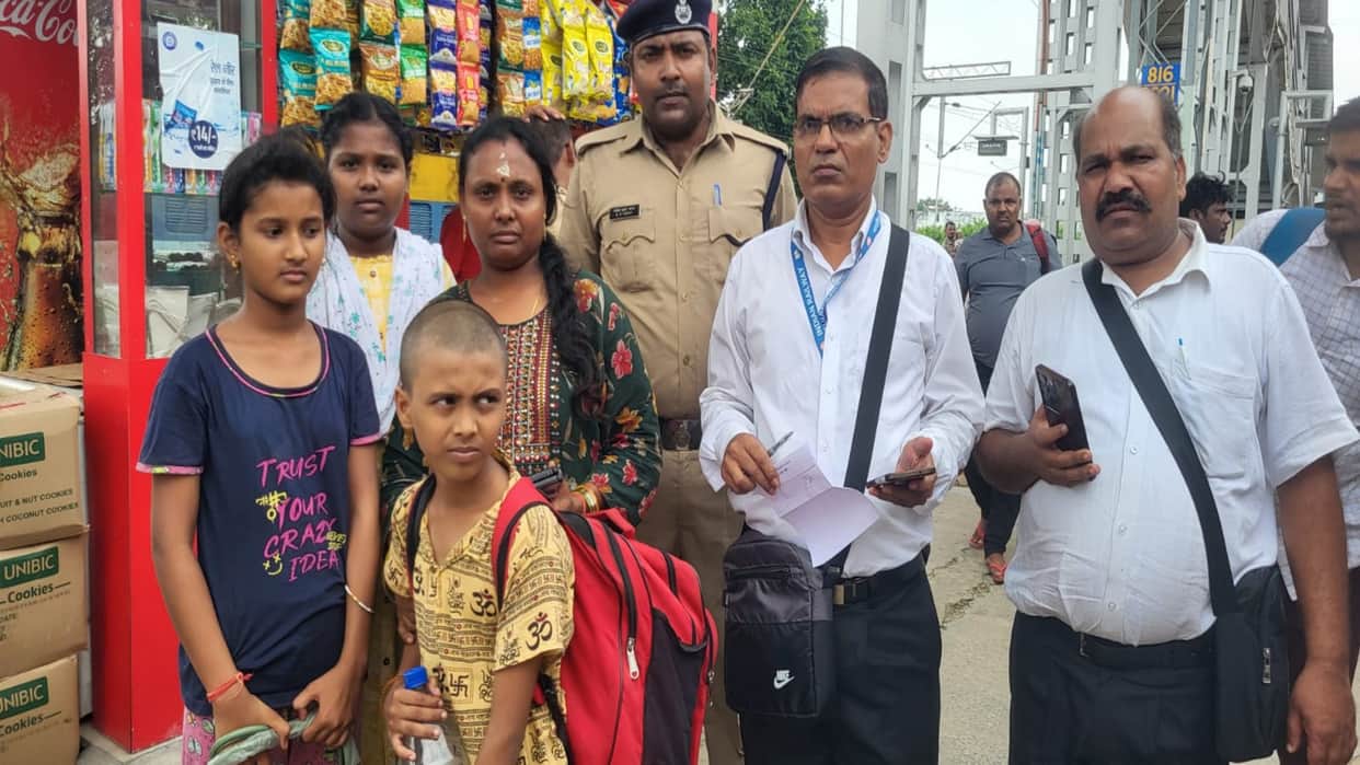 Three separated young children reunited with their families after a non-stop train was halted mid-journey.
