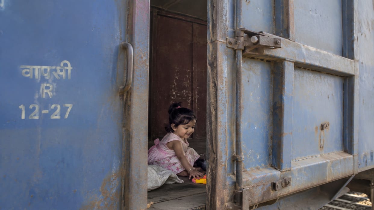 Two-and-a-half-year-old girl found alone in an empty goods train wagon; GRP hands her over to Childline.