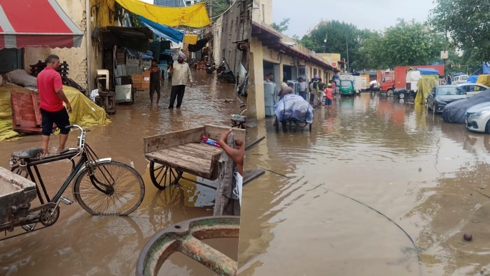 Water entered shops in Kamala Market due to a burst pipeline