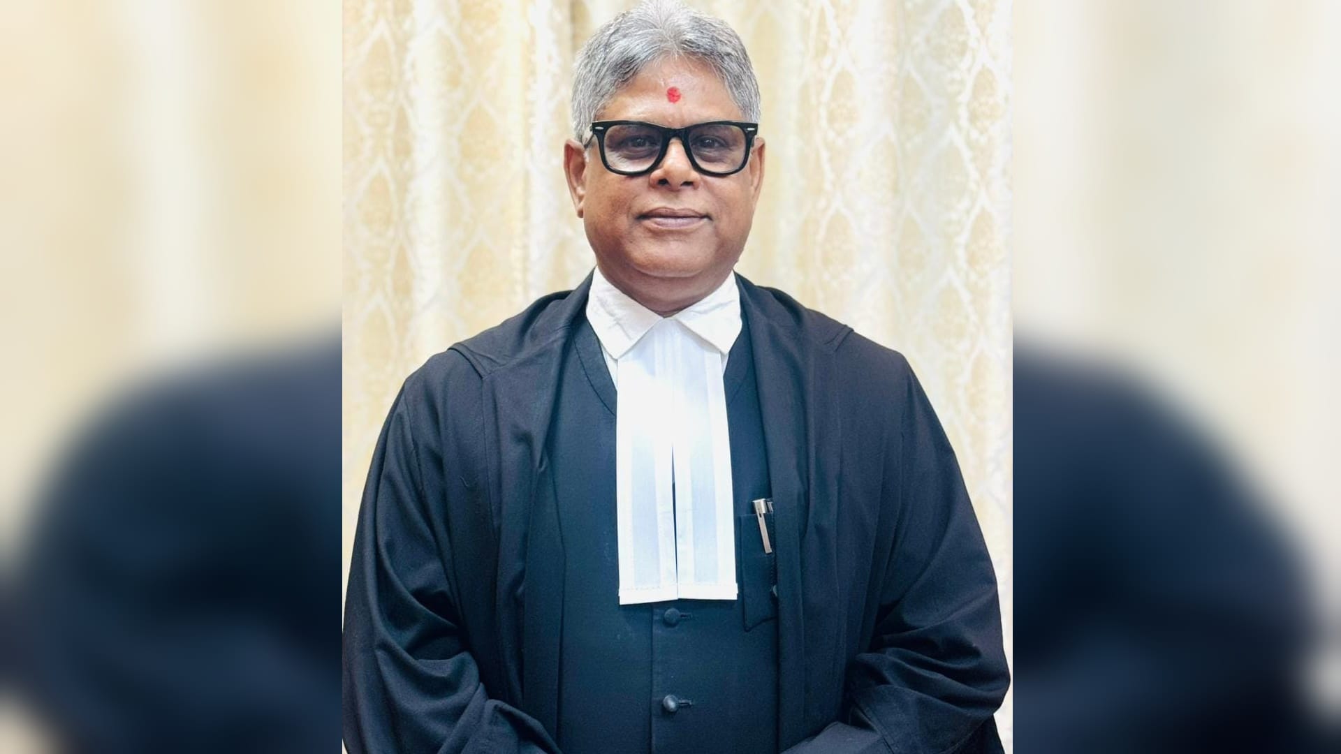 डॉ. गौतम चौधरी, न्यायमूर्ति।