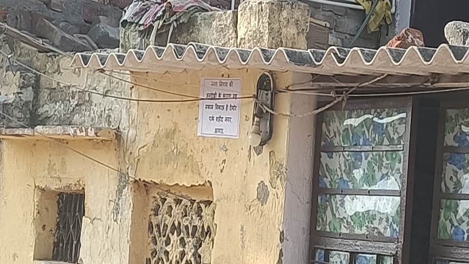 Troubled by overflowing sewers and drains residents put up House for Sale posters in agra