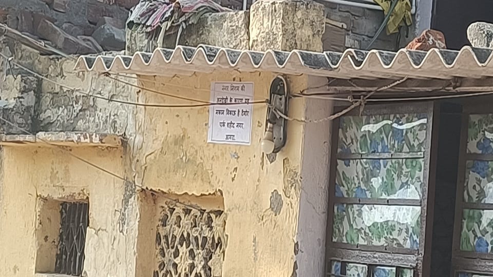 Troubled by overflowing sewers and drains residents put up House for Sale posters in agra