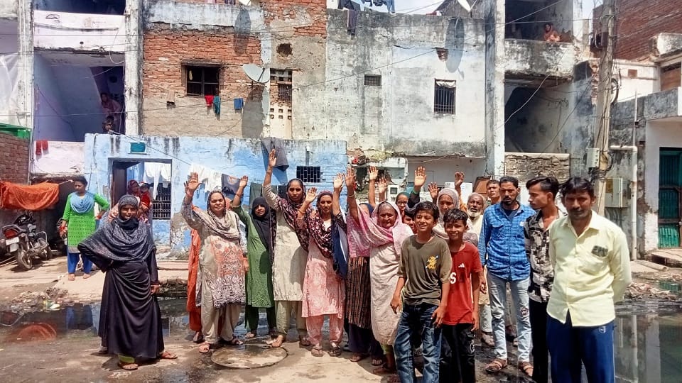 Troubled by overflowing sewers and drains residents put up House for Sale posters in agra