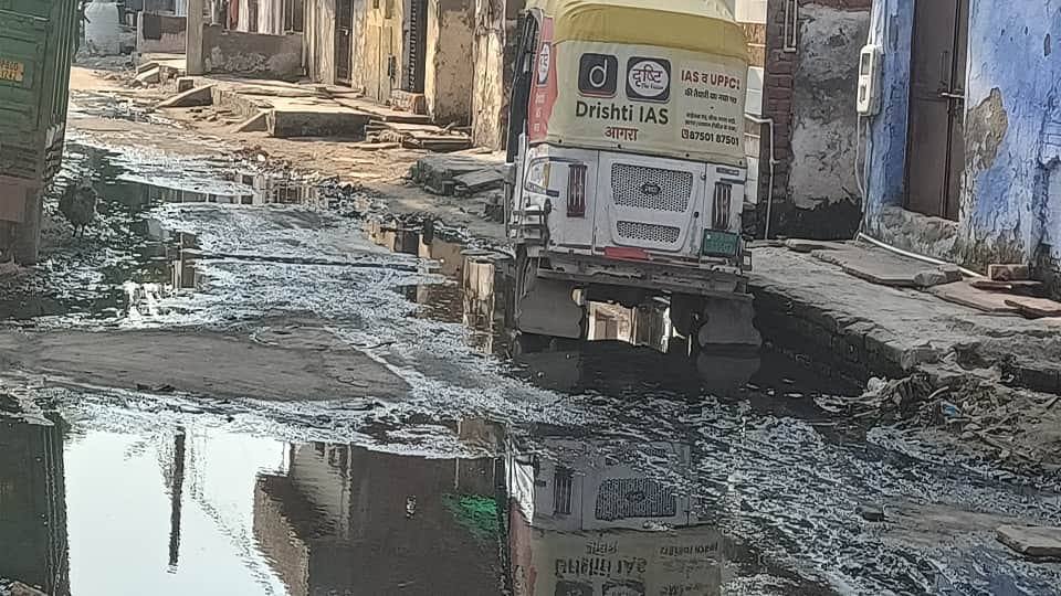 Troubled by overflowing sewers and drains residents put up House for Sale posters in agra