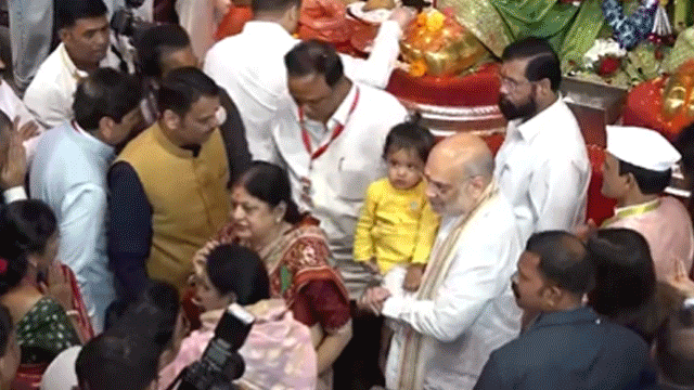 Ganpati Festival Amit Shah Offers Prayers at Lalbaugcha Raja Family Telangana CM Revanth Reddy Performs Puja