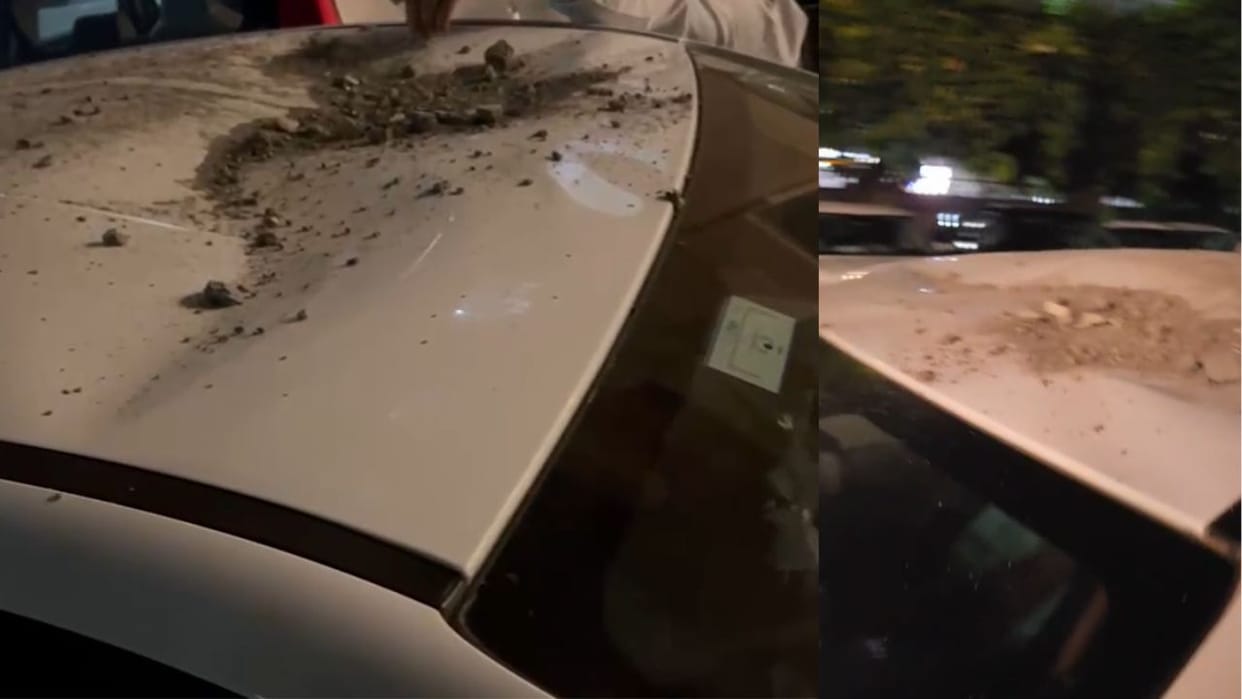 Debris fell onto roof of  car at Ajnara Homes Society in Greater Noida West